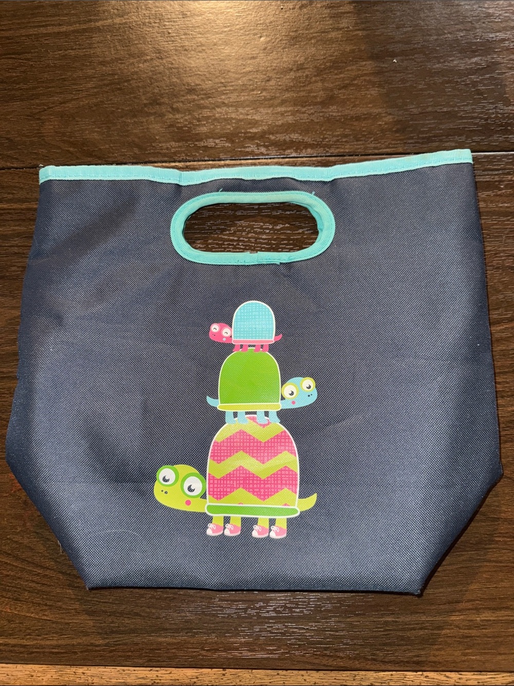 Thirty-One Navy Insulated Lunch Tote with Teal Trim and Colorful Turtle Stack